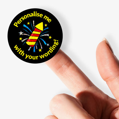 Round sparkly sticker with text 'Personalise me with your wording!' held by a finger on a white background