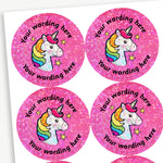 Sheet of round, holographic pink stickers, each featuring a unicorn at the centre. Surrounding is placeholder text reading 'Your wording here' above and below, indicating customisable areas for personalised messages