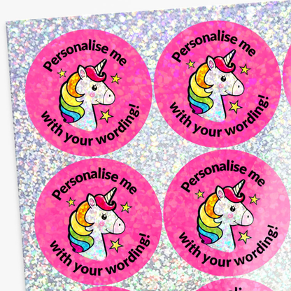 Pink stickers with unicorn designs and text on a glittery background