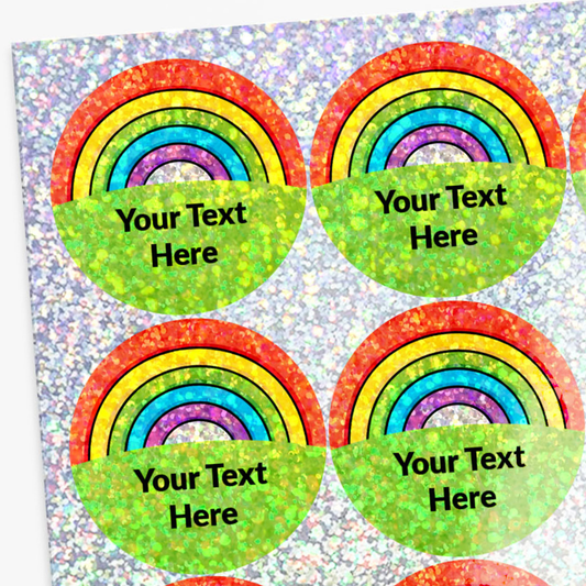 Four rainbow-themed labels with customizable text on a glittery background