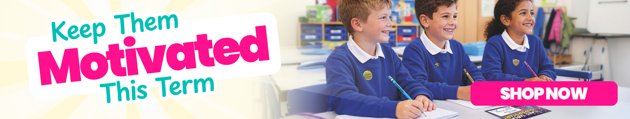 Children in school uniforms sitting at a desk with promotional text 'Keep Them Motivated This Term' and 'Shop Now'.