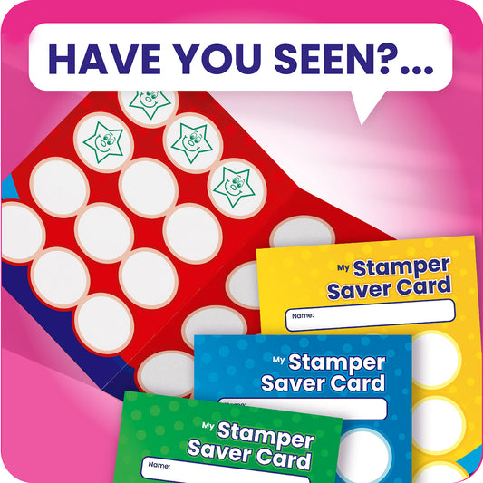 A set of brightly coloured 'Stamper Saver Cards' for tracking student rewards. One red card is opened, showing circular spaces for stamps, some filled with green star designs featuring smiley faces and one gold star sticker. Below are additional cards in blue, yellow, green, and purple, each with a blank name section and the title 'My Stamper Saver Card'.