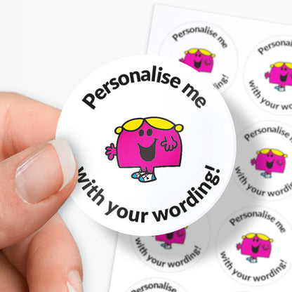 Circular sticker with a pink character and text 'Personalise me with your wording!' held by a hand.