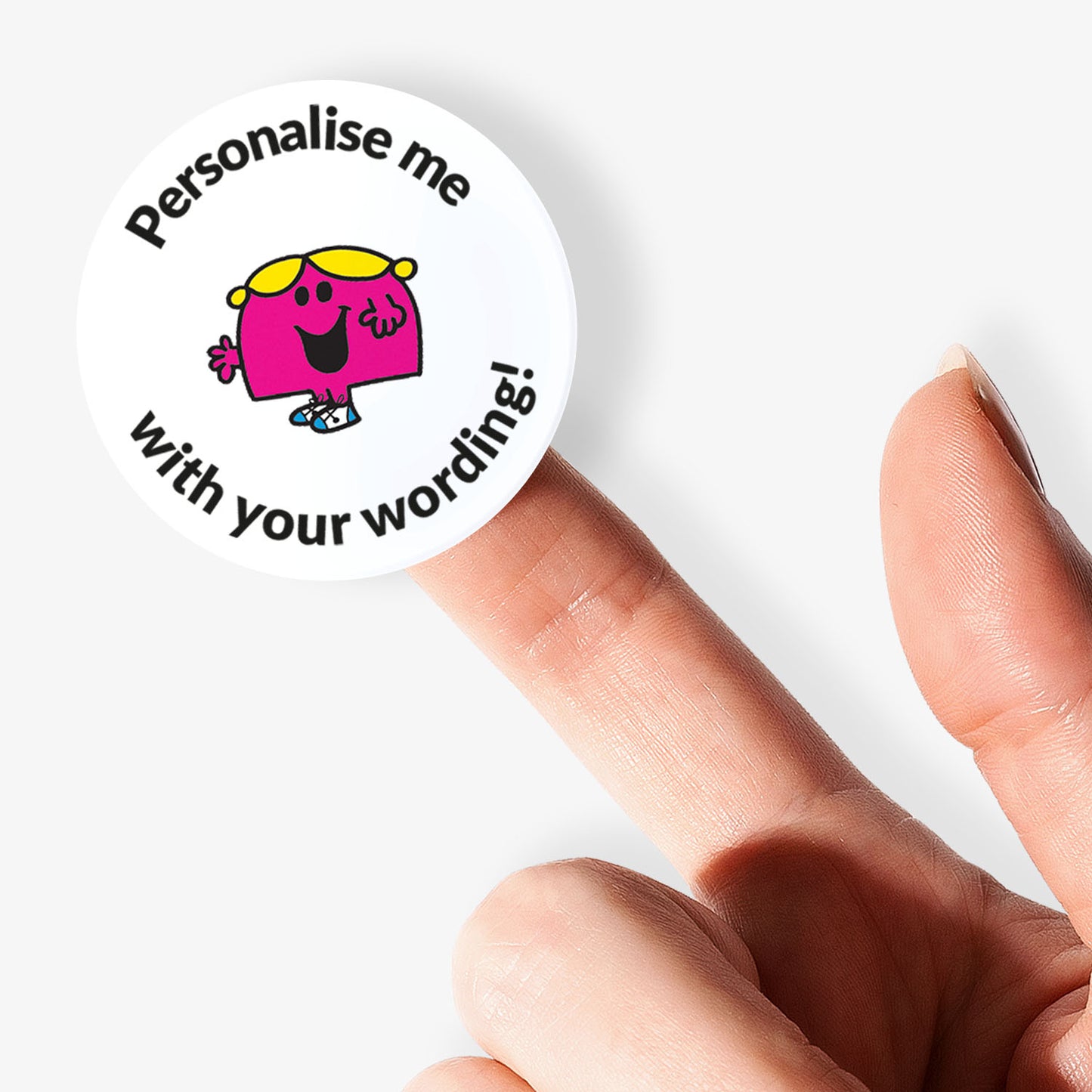 Circular sticker with cartoon character and text 'Personalise me with your wording!' held by a finger.