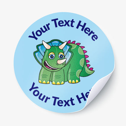 Round sticker with a green dinosaur illustration and text space on a light blue background.