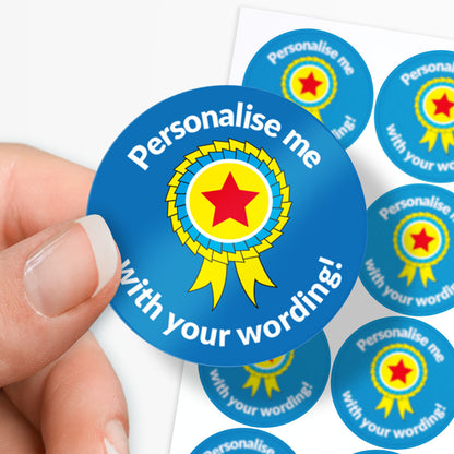 Circular blue sticker with a yellow star and text 'Personalise me with your wording!' held by a hand.