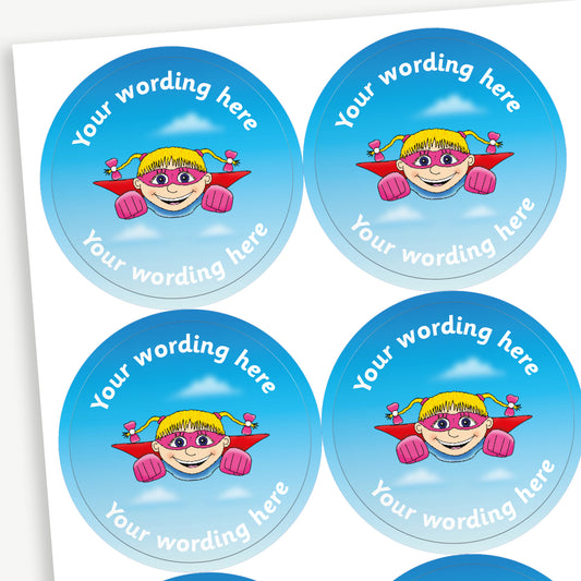 A sheet of customisable circular stickers featuring a girl superhero flying through the sky; includes customisable text above and below the image.