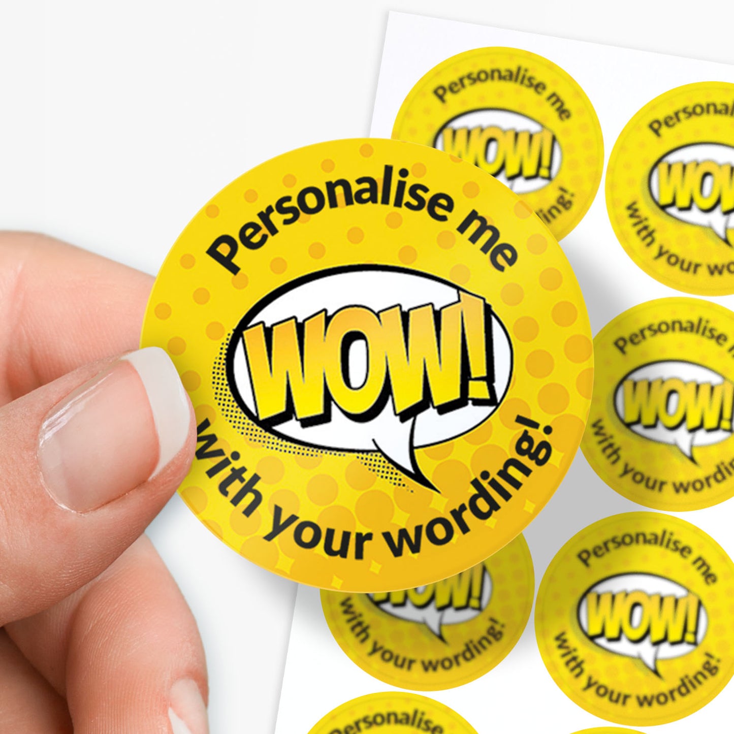 Yellow stickers with 'WOW!' text and a hand holding one of them.
