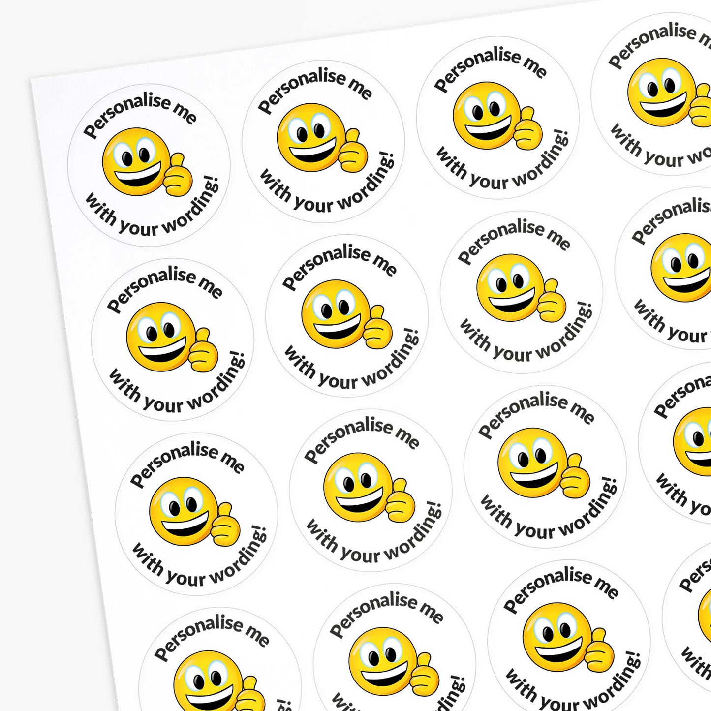 Sheet of personalized smiley face stickers with customizable text.