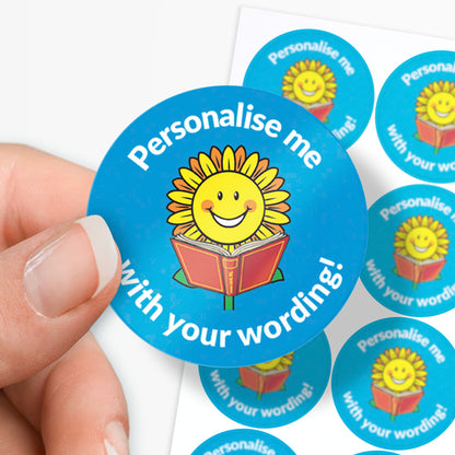 Blue stickers with a smiling sunflower reading a book as a central image.  Space for personalisation above and below the image.