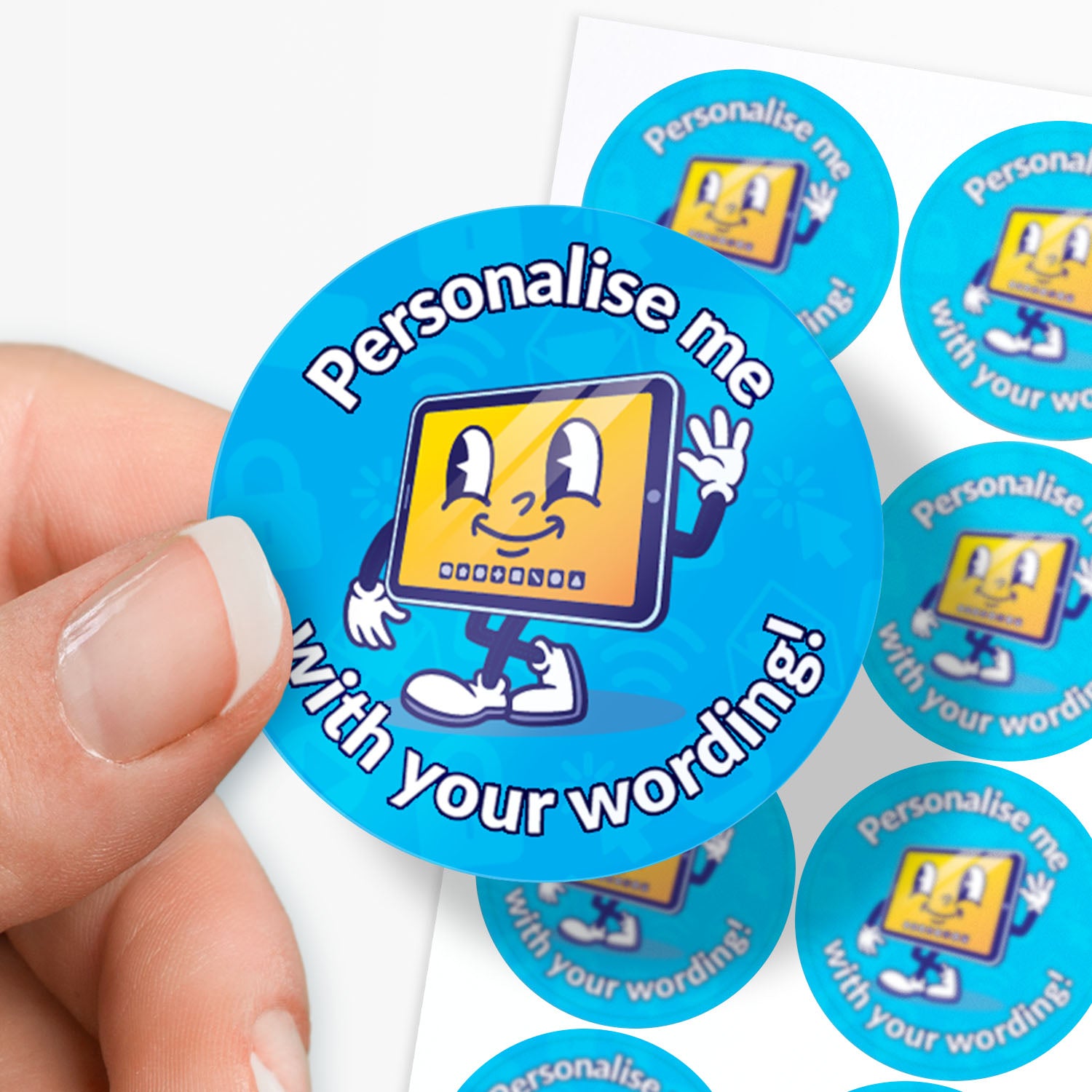 Circular blue sticker with cartoon character and text 'Personalise me with your wording!' held by a hand.