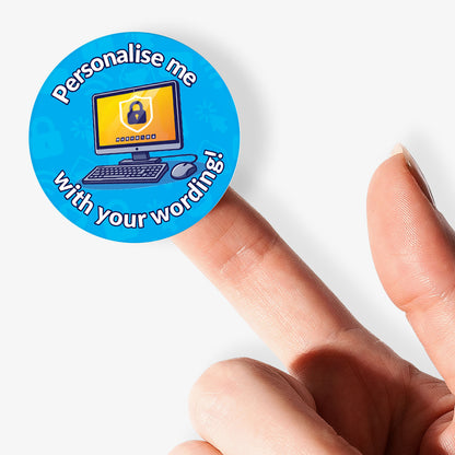 Round blue sticker with computer graphic and text 'Personalise me with your wording!' held by a finger.