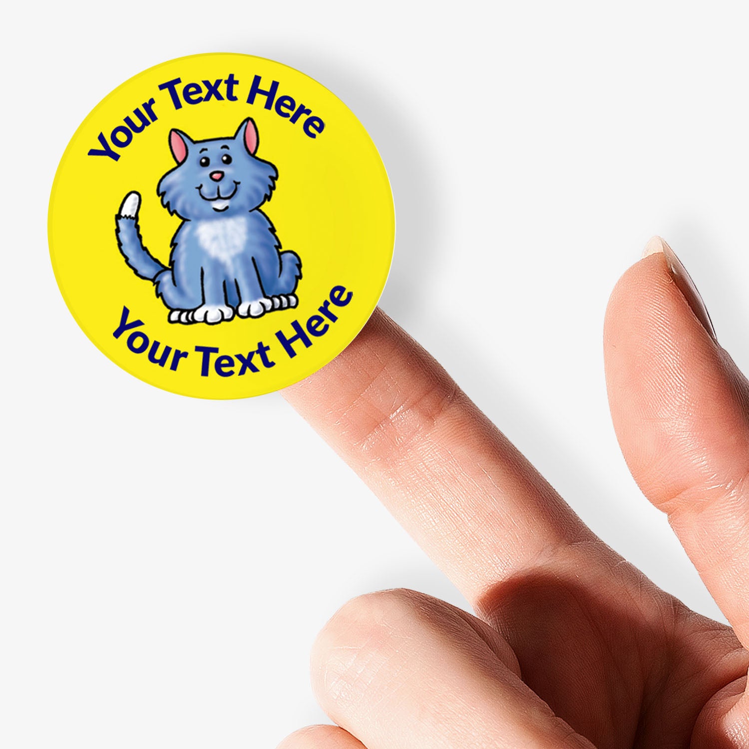 Personalizable sticker with a cat illustration and text space, held by a hand.