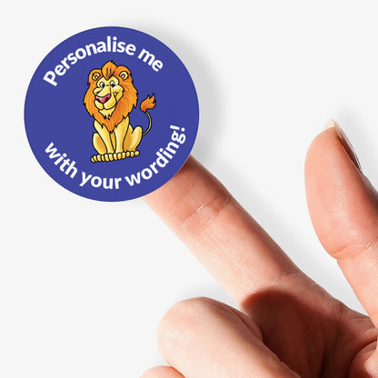 Blue sticker, on a finger, with a lion as the central image.  Space for personalisation above and below the image.
