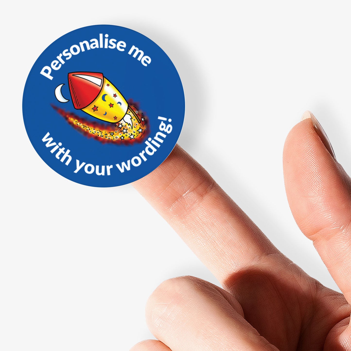 Blue sticker, on a finger, with a firework as the central image.  Space for personalisation above and below the image.