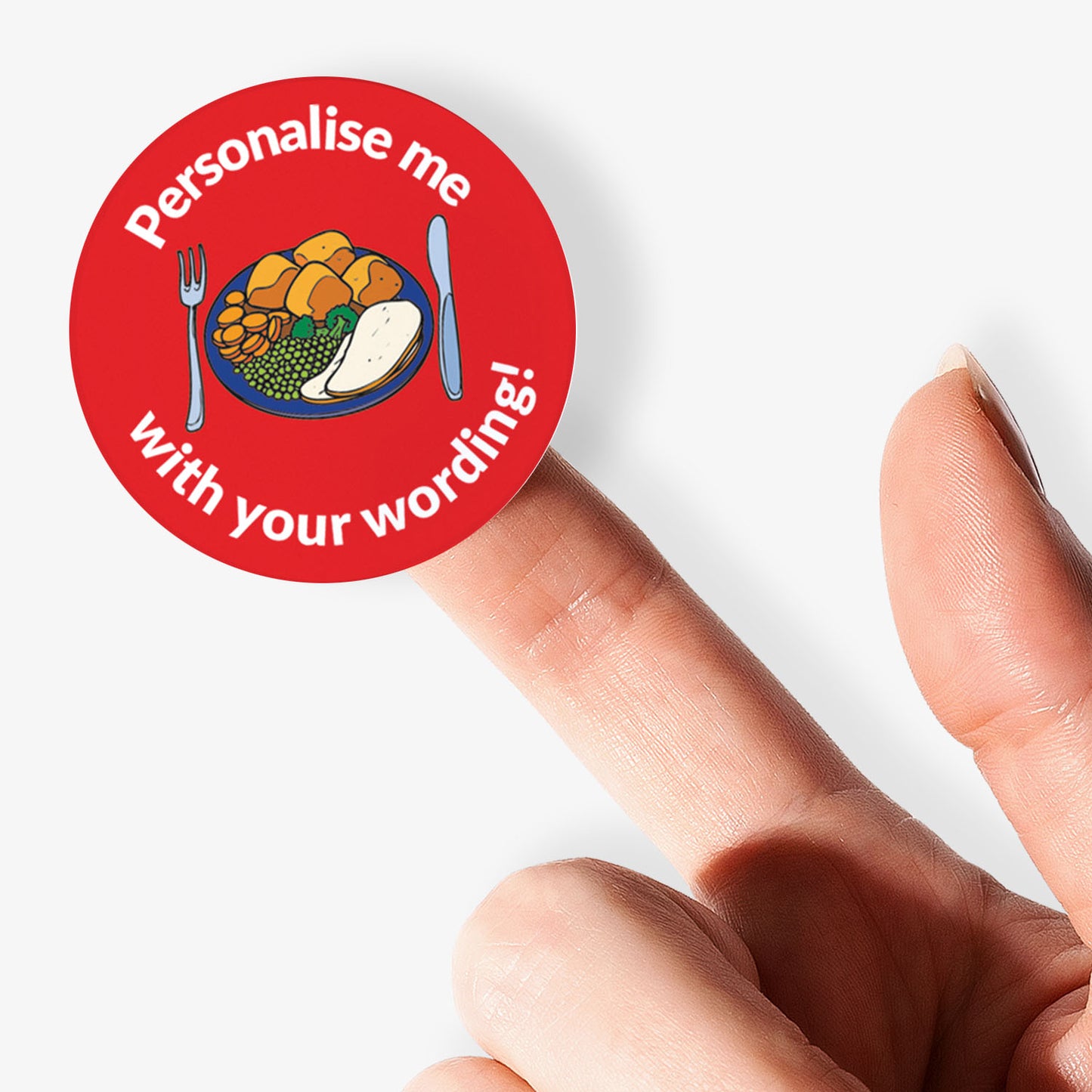Red sticker, on a finger, with a plate of food as the central image.  Space for personalisation above and below the image.