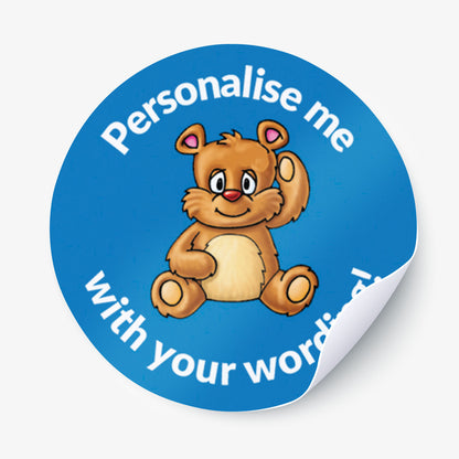 Round blue sticker with a teddy bear graphic and text 'Personalise me with your words' on a white background.