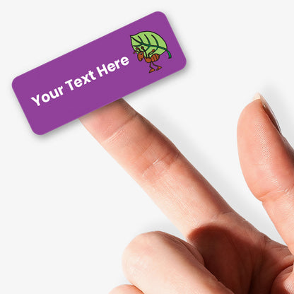 Sheet of Purple stickers with white text and an ant with leaf icon, held by a hand on a white background.