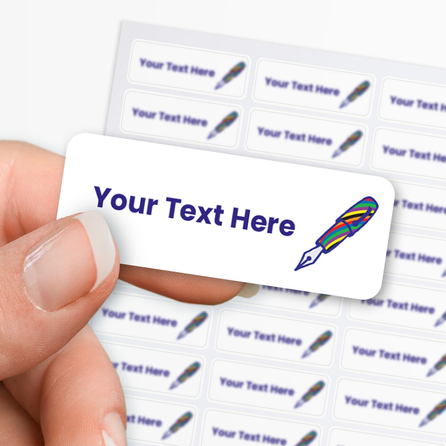 Personalised sticker with fountain pen design and customisable text held by hand with sheet of stickers in the background.