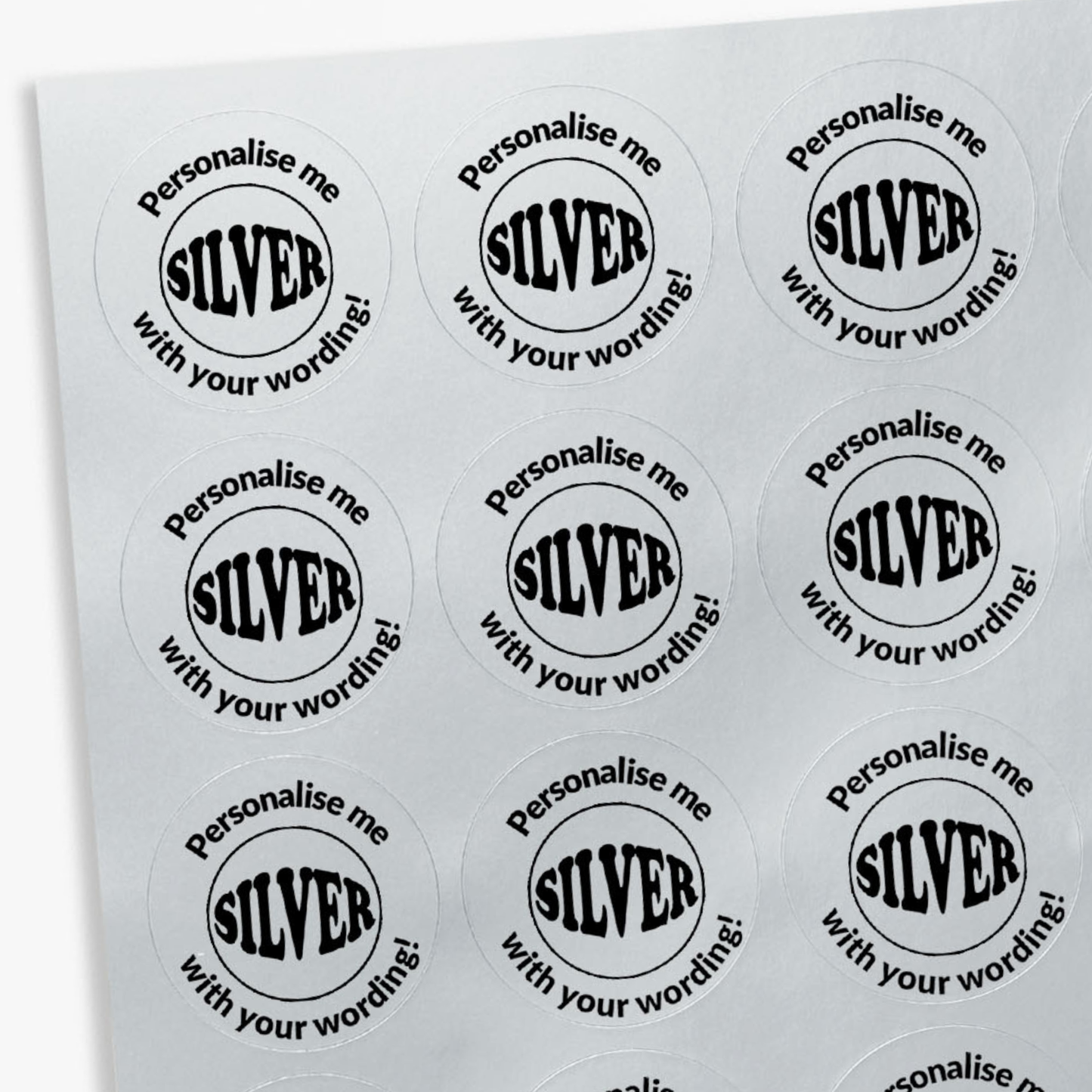 Round stickers with 'Personalise me SILVER with your wording!' text on a silver background