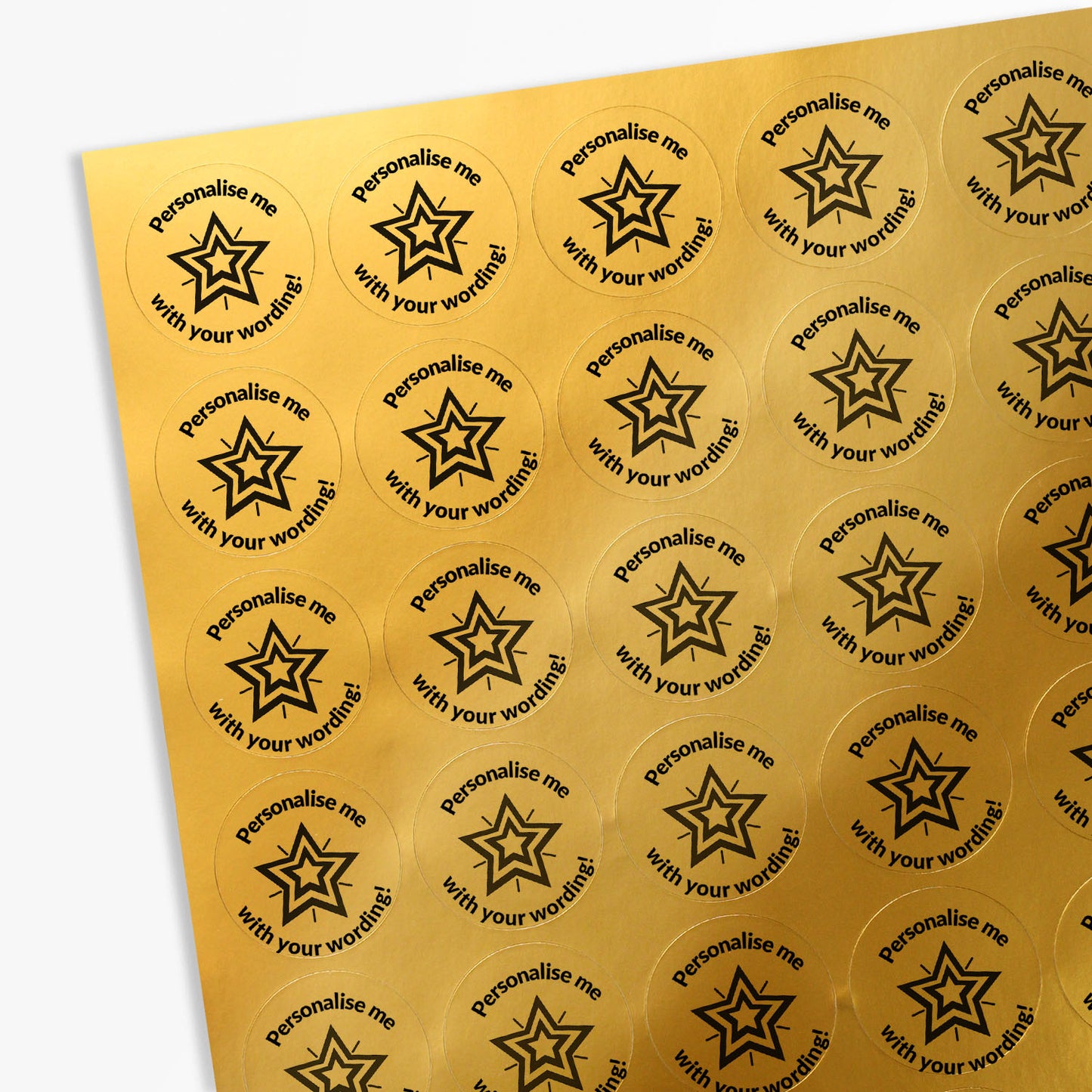 Sheet of gold stickers with a black star in the middle and text 