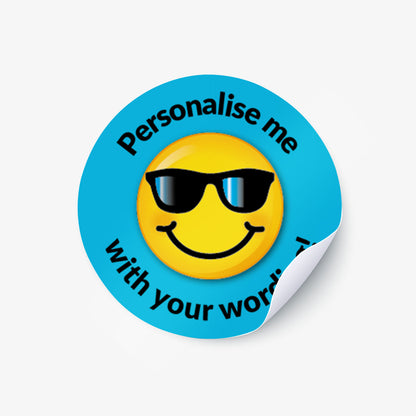 Round sticker with a smiley face wearing sunglasses and text 'Personalise me with your words!' on a blue background.