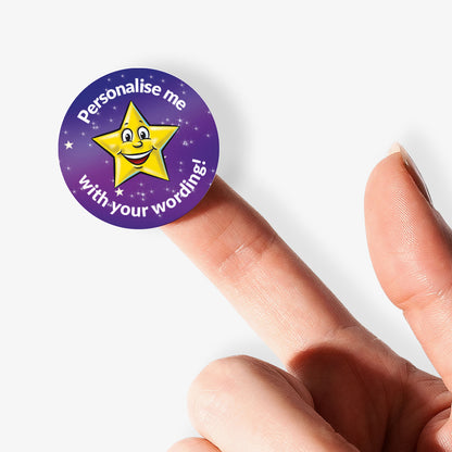 Round purple sticker with a yellow star and text 'Personalise me with your wording!' held between fingers.