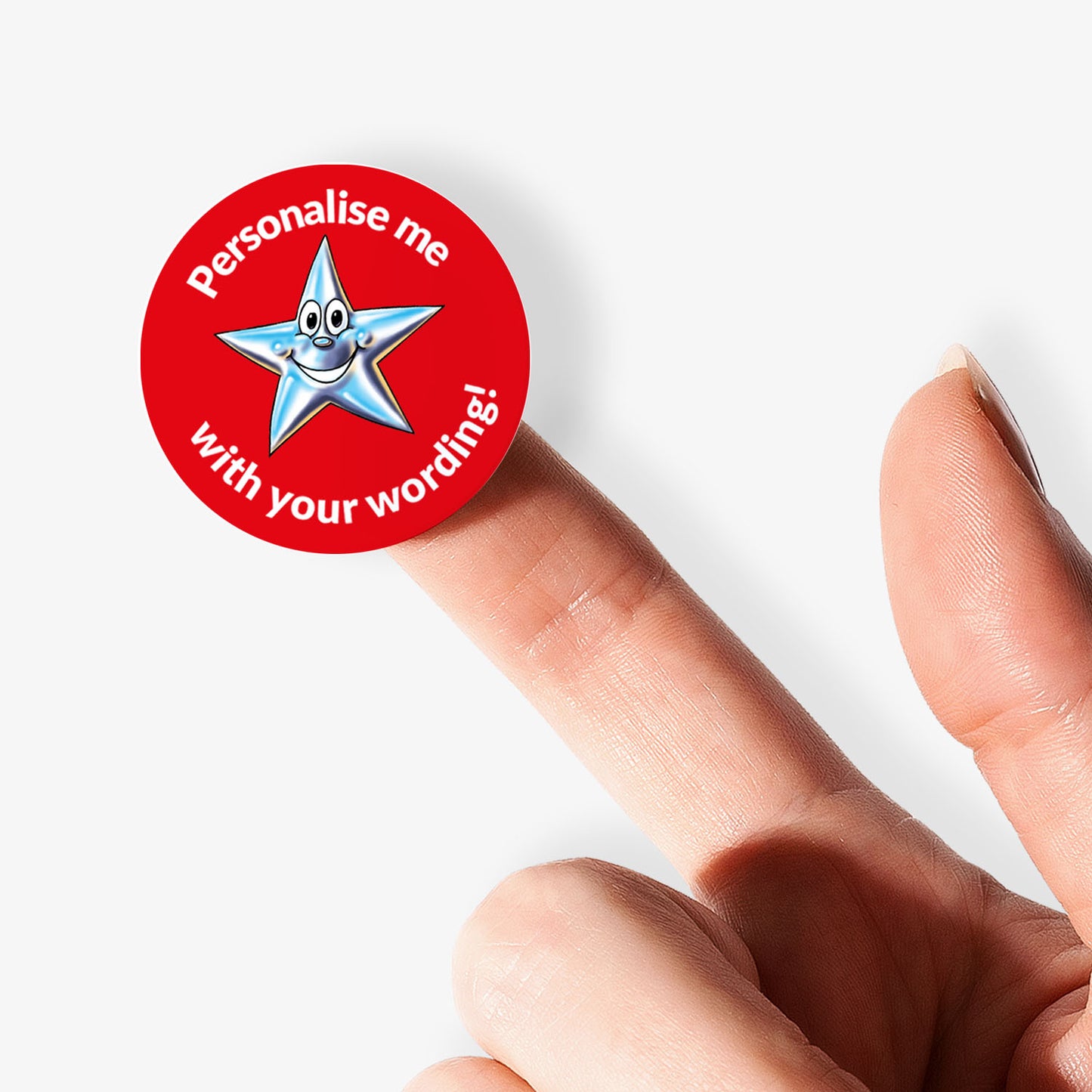 Red sticker with a star graphic and text 'Personalise me with your wording!' held between fingers.