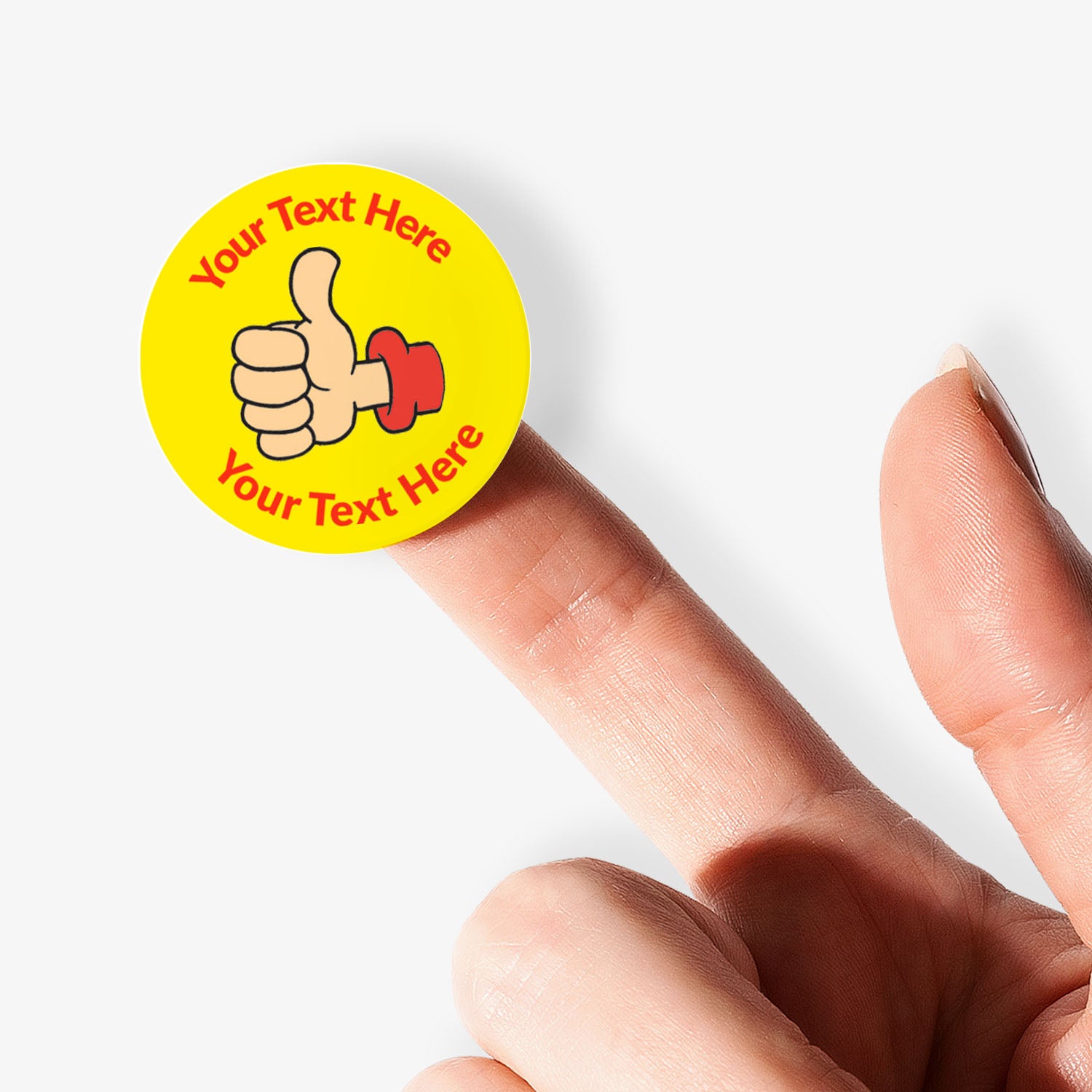 Yellow sticker with a red thumb up icon and customisable text on a finger against a white background