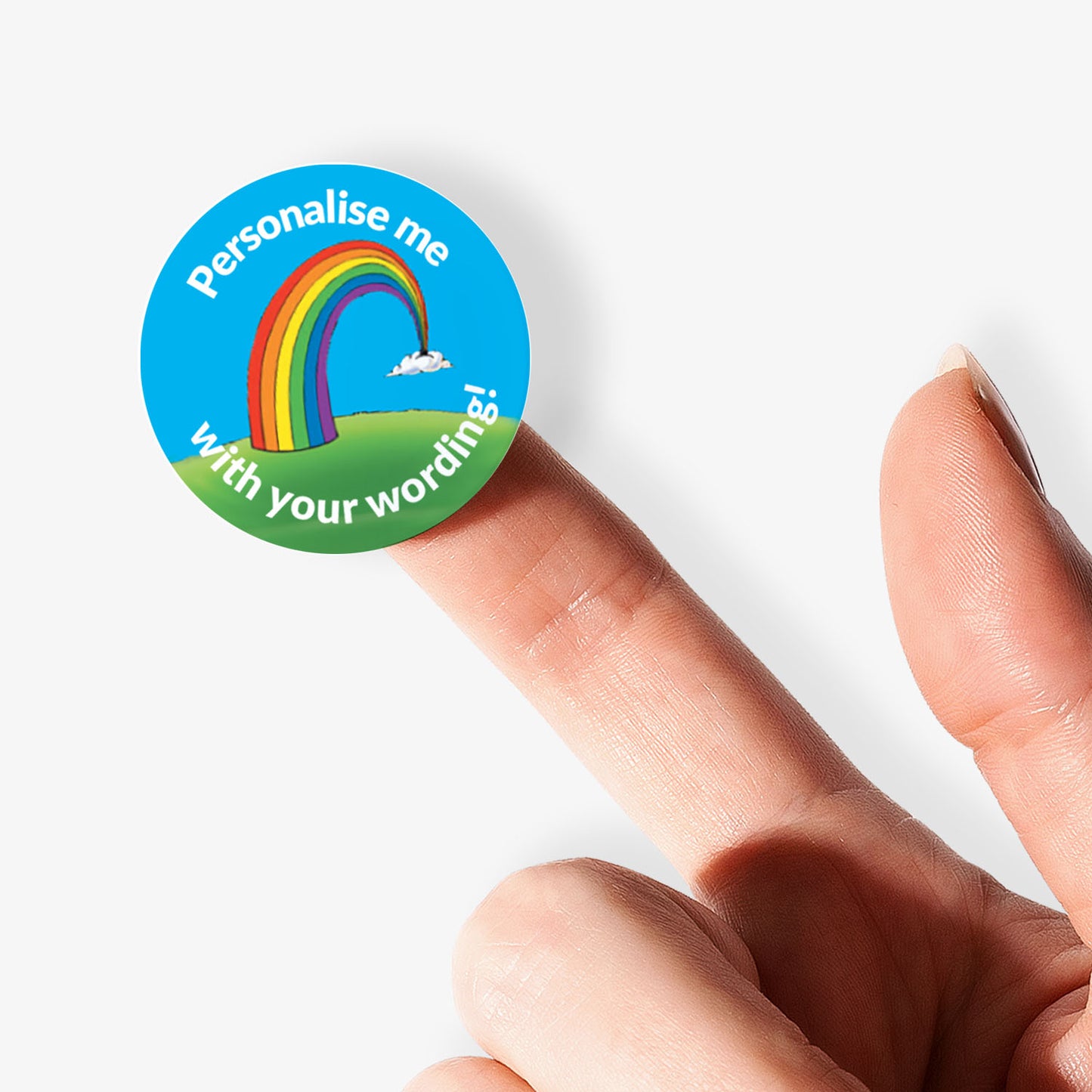 Sticker on a finger with a rainbow  as a central image.  'Personalise me with your wording!' surrounds the image.