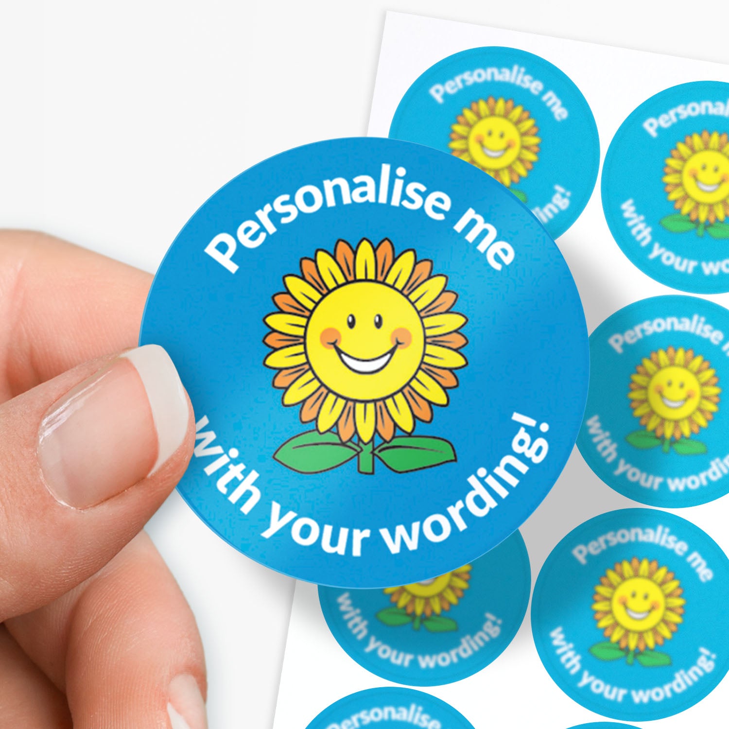 Blue sticker with a smiling sunflower central with 'Personalise me' above and 'with your wording' below
