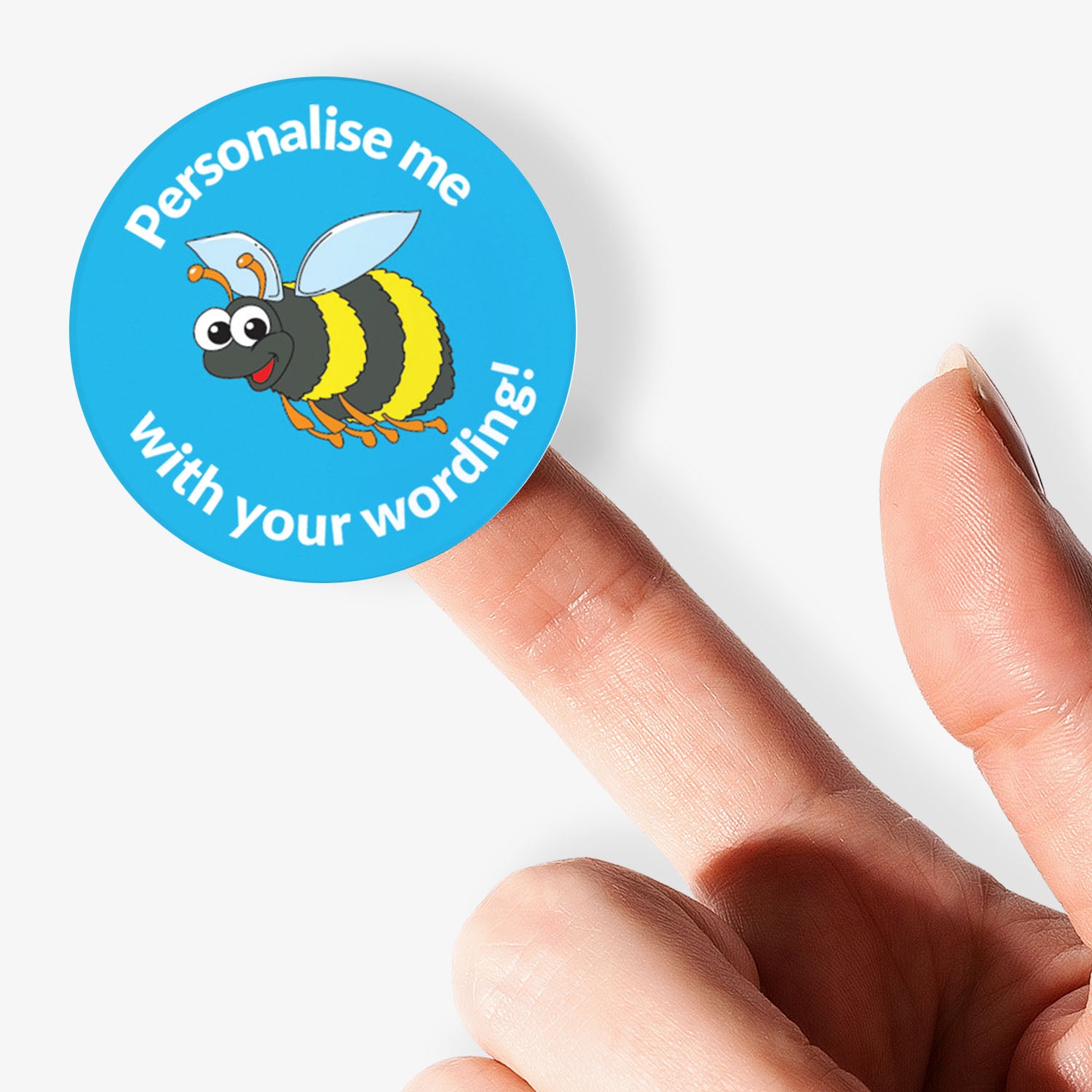 Blue sticker with a bumble bee central with 'Personalise me' above and 'with your wording' below on a finger