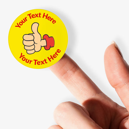 Yellow sticker with a thumbs-up icon and 'Your Text Here' text on a finger