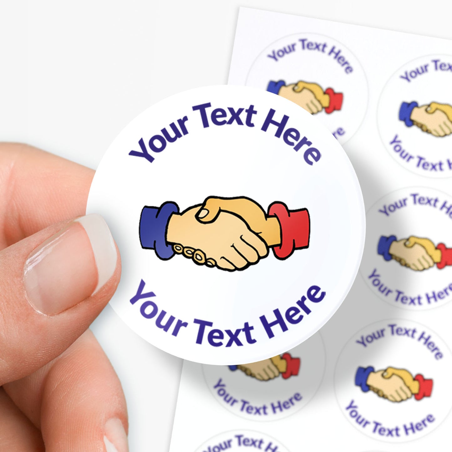 Round sticker with handshake graphic and customizable text held by a hand.
