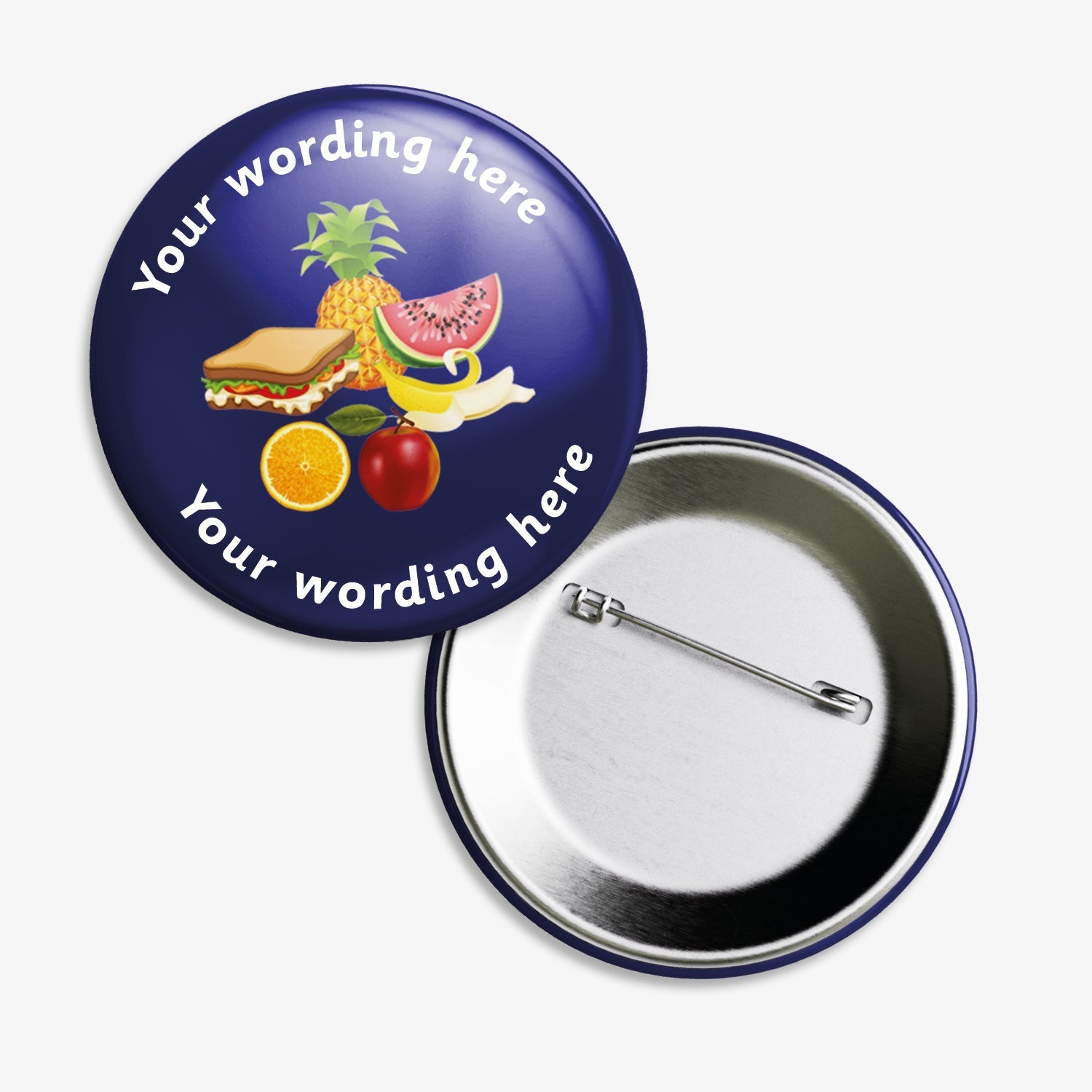 Set of ten 38mm round badges with a dark blue background, featuring a central illustration of a sandwich, pineapple, watermelon slice, orange, and apple; customisable text areas are positioned above and below the image, and the badge includes a safety pin backing.