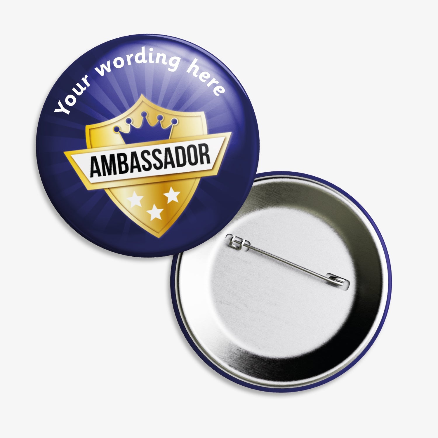 Set of ten 38mm round personalised badges featuring a shield design with a gold crown and stars on a deep blue background; includes customisable white text above and below the shield, equipped with safety pin fastenings—ideal for recognising pupil ambassadors.

