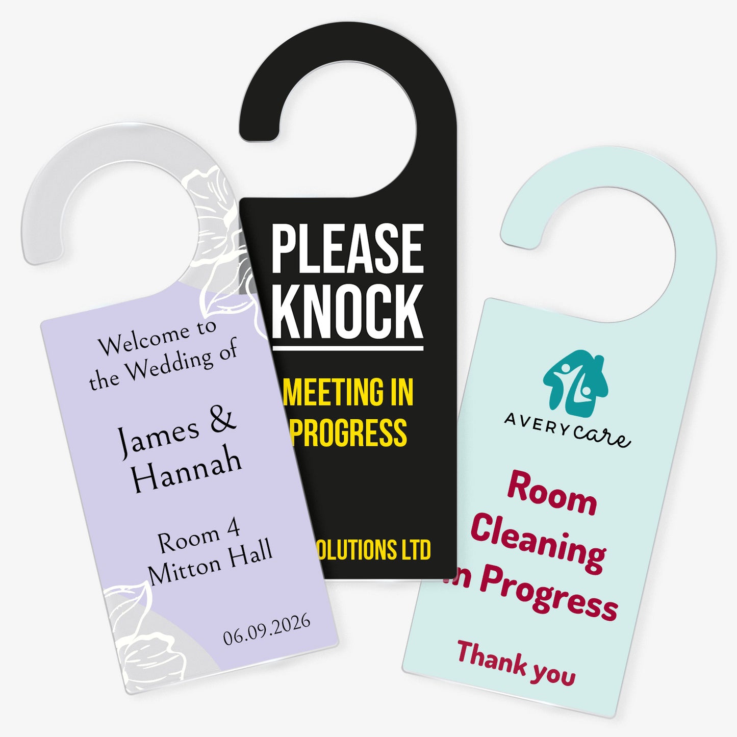 Three Acrylic Door Hangers left design ornate purple wedding design for 'James & Hannah', Middle design 'Please Knock Meeting In Progress on black background, right door hanger ' Room Cleaning in Progress' on a pale teal background