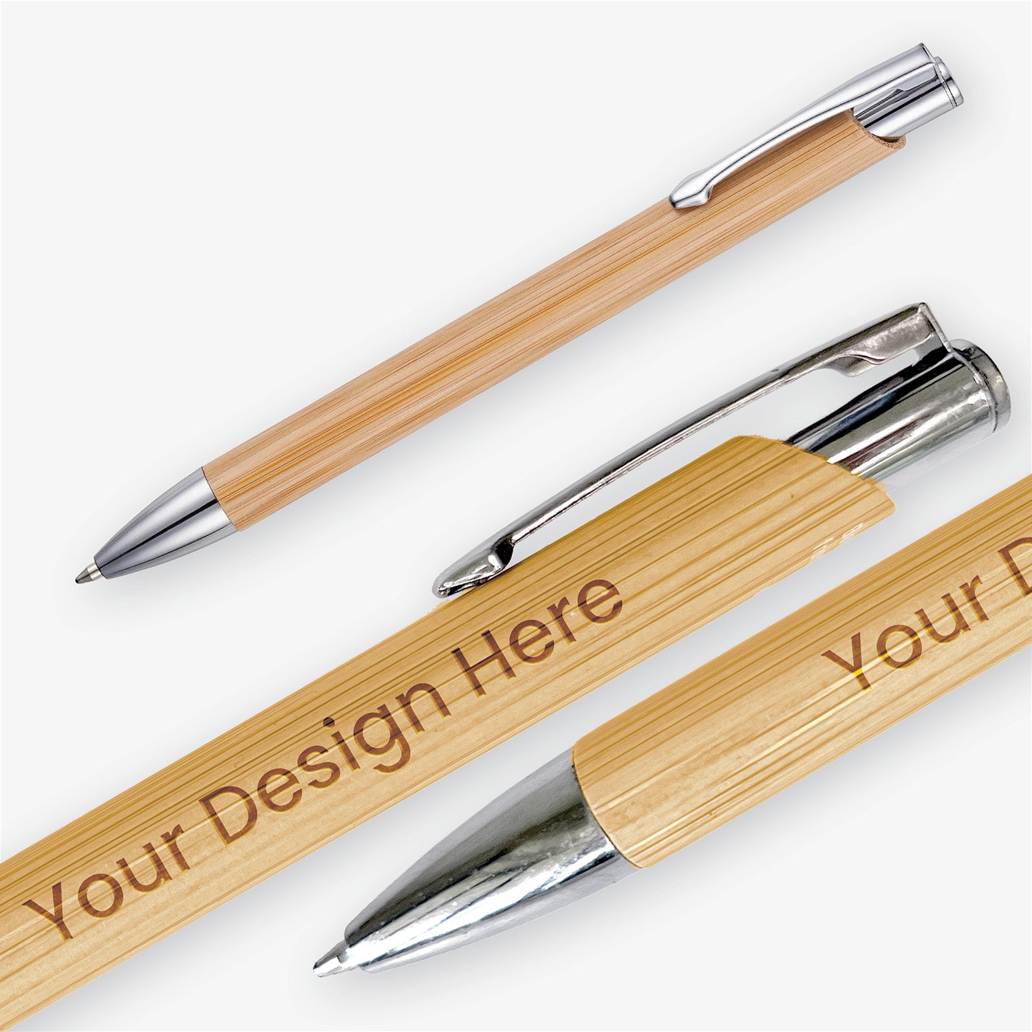 Personalised bamboo ballpoint pen displayed from several angles, showing its natural wood grain and polished silver details.