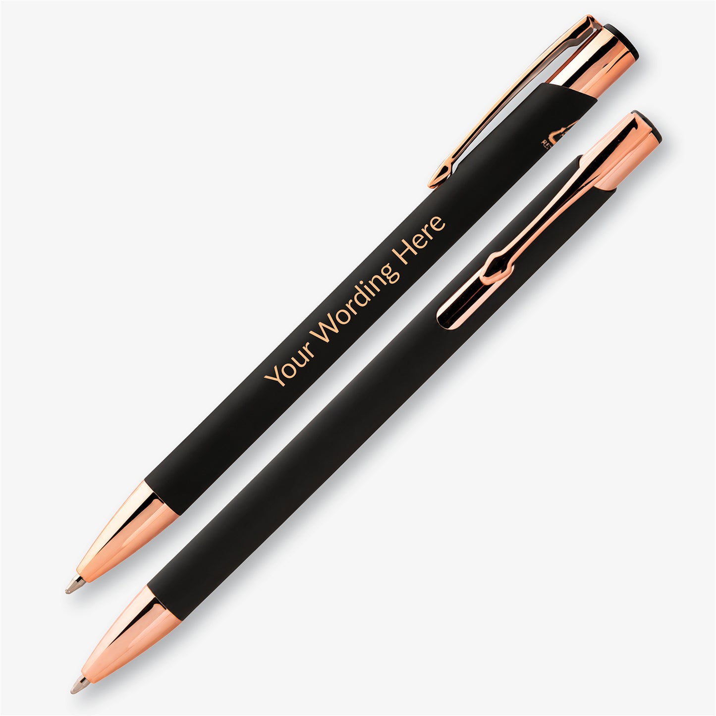 Two black personalised pens with rose gold detailing, showing the engraved wording and metal pocket clip.
