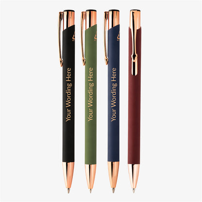 Personalised pens in black, green, navy and burgundy with rose gold trim, displayed upright on a white background.