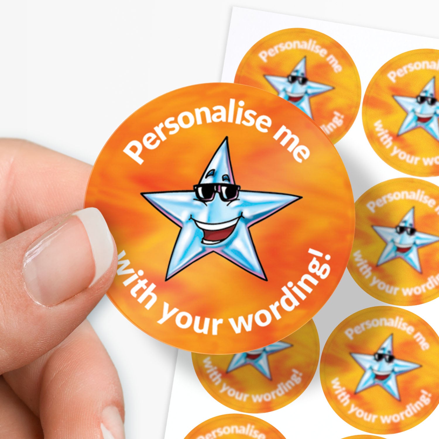 Orange stickers with a silver smiling star as the central image.  Space for personalisation above and below the image.