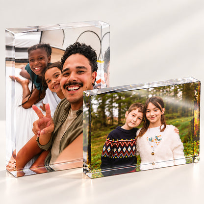 Two freestanding acrylic photo blocks displaying family photographs