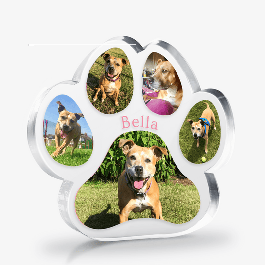Paw-shaped Acrylic Block with multiple photos of a dog named Bella on a white background