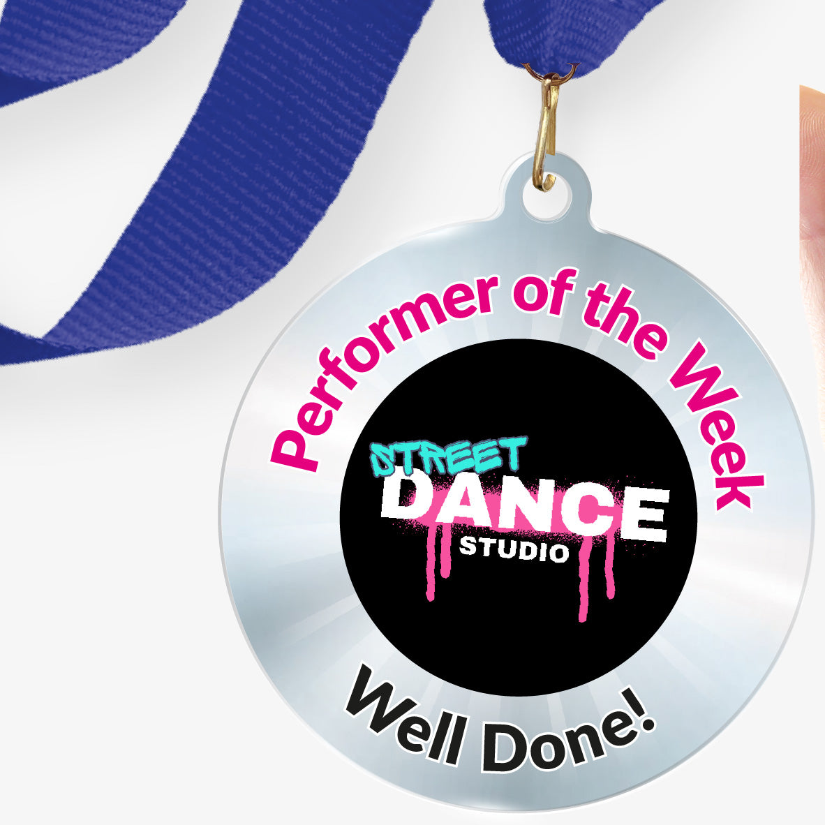 Acrylic personalised medal with blue ribbon showing silver design with 'Street Dance Studio image' and 'Performer of the Week', 'Well done!' wording.