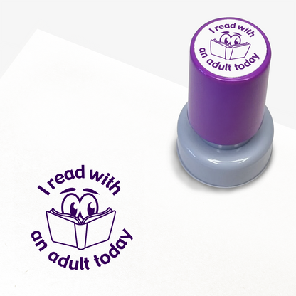 Purple ink teacher stamper with 'I read with an adult today' text.