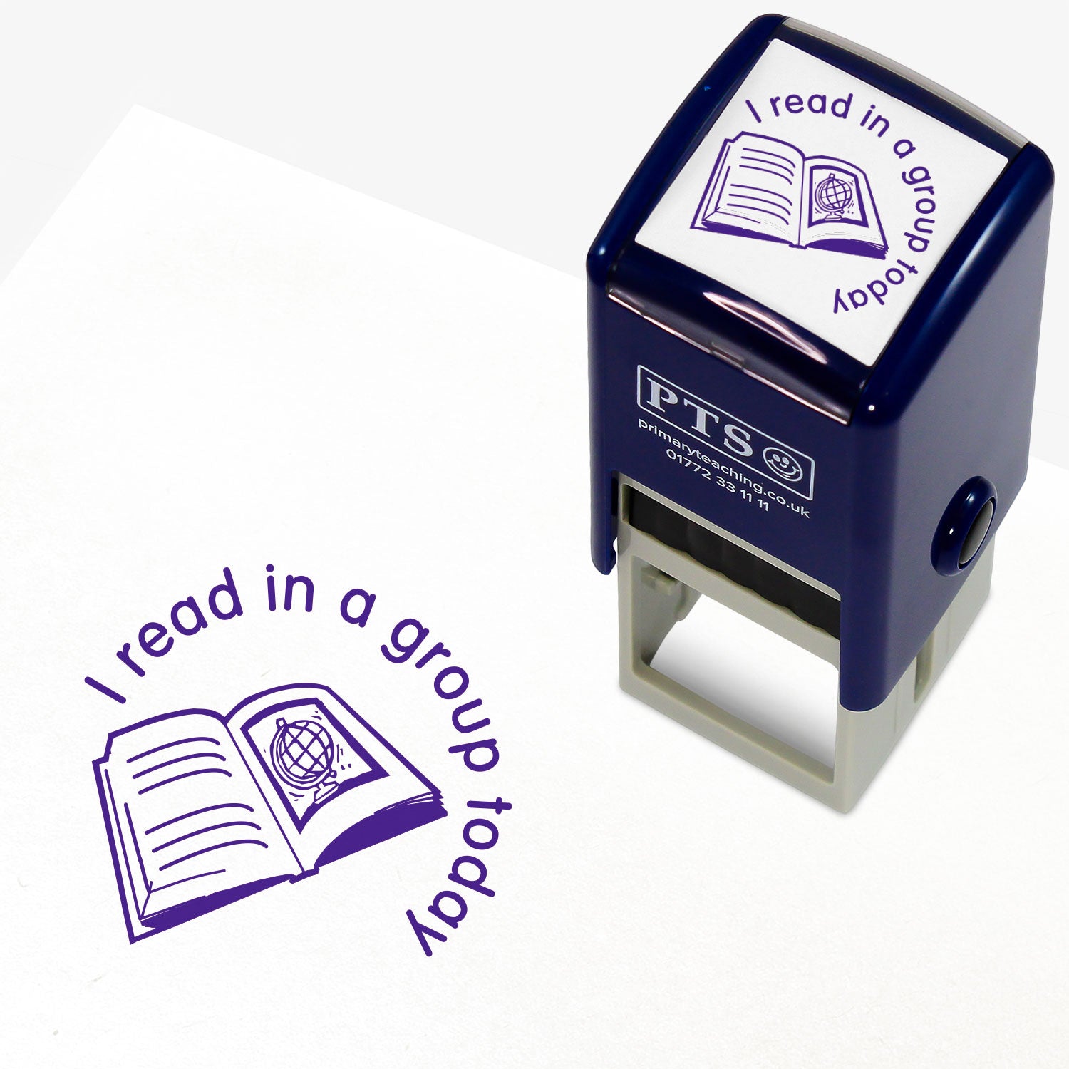 25mm self-inking stamper with purple ink, featuring the phrase 'I read in a group today' in a curved font above an open book illustration with a globe;  ideal for marking pupils' reading records.