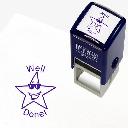 Well Done Star with Sunglasses Stamper from Primary Teaching Services, featuring a 25mm circular stamp design with a smiling star character wearing sunglasses and the text 'Well Done!' in bold purple letters. The stamper has a dark blue casing, ideal for rewarding pupil achievements.