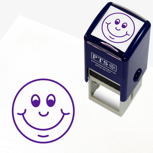 Purple 25mm pre-inked stamper featuring a cheerful smiley face design, with customisable text above and below the image, ideal for classroom marking and pupil encouragement.
