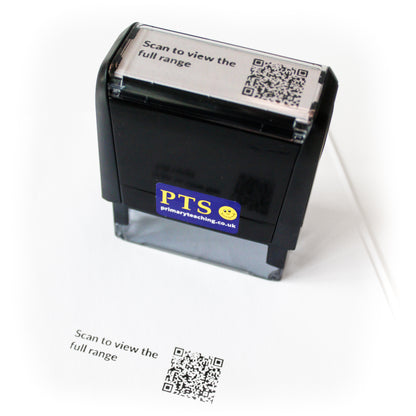 Custom QR code self-inking stamp shown stamping the text “Scan to view the full range” onto white paper.