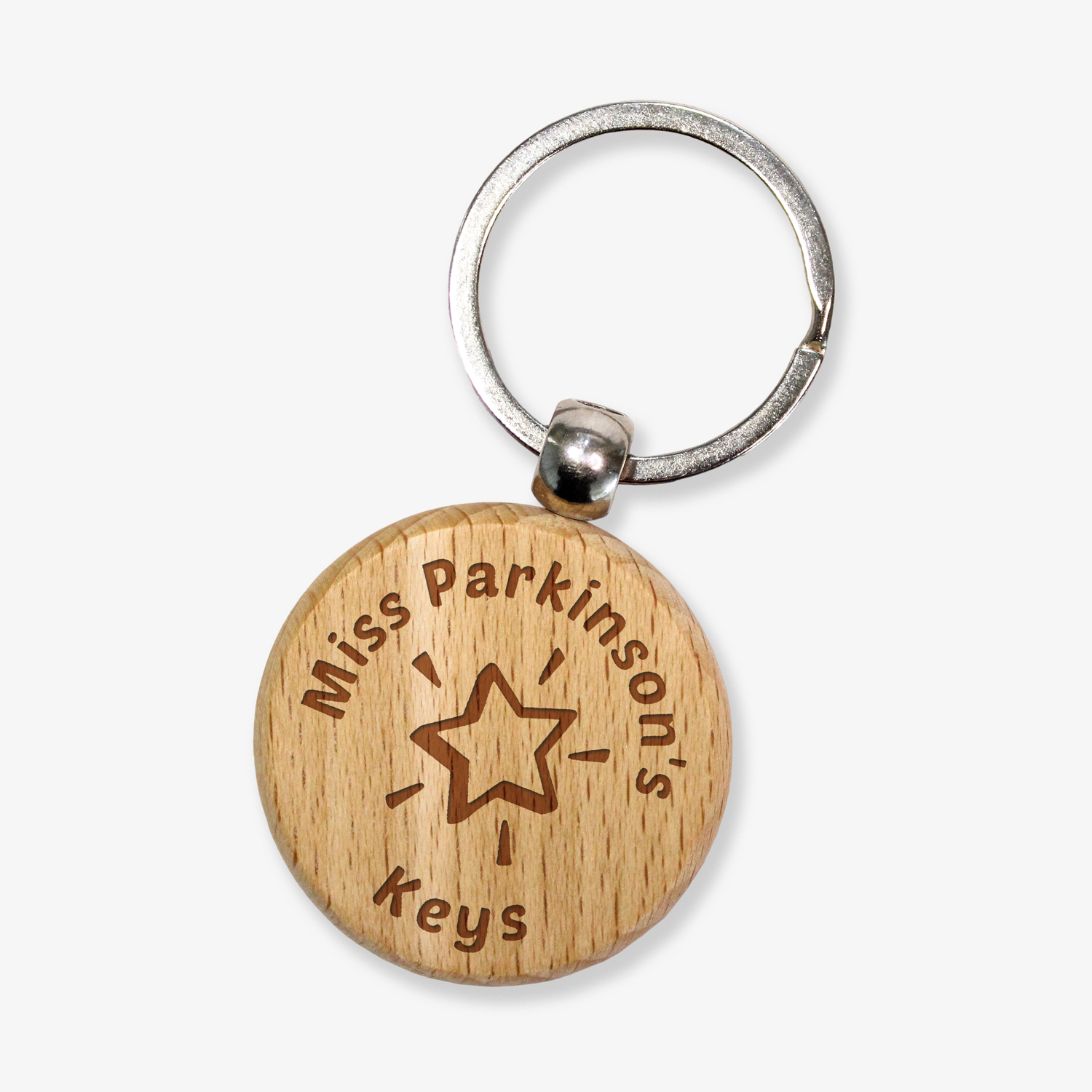 Circular wooden keyring with a metal ring, engraved with text for customisation saying 'Miss Parkinson's' a central image of a star etched and underneath 'Keys' 